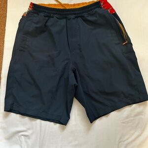 Birdsongs Boom andNavy Blue Athletic Shorts with Red and Yellow Accents